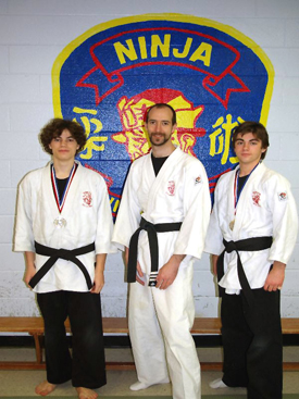 Sensei Daniel Kennedy and Belleville Tournament medal winners